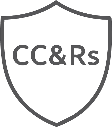 Black shield emblem with gray outline and the text 'CC&Rs' in gray letters.