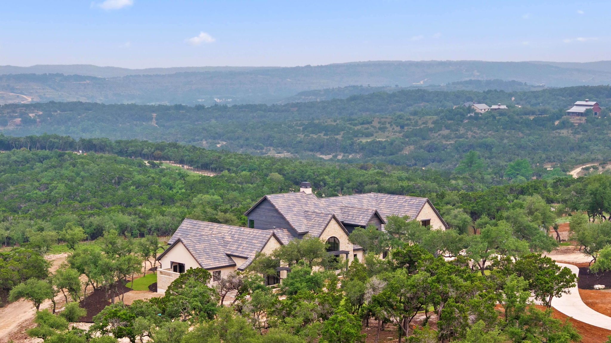 Private ranchette homesite beneath mature oaks at RanchesAt Driftwood